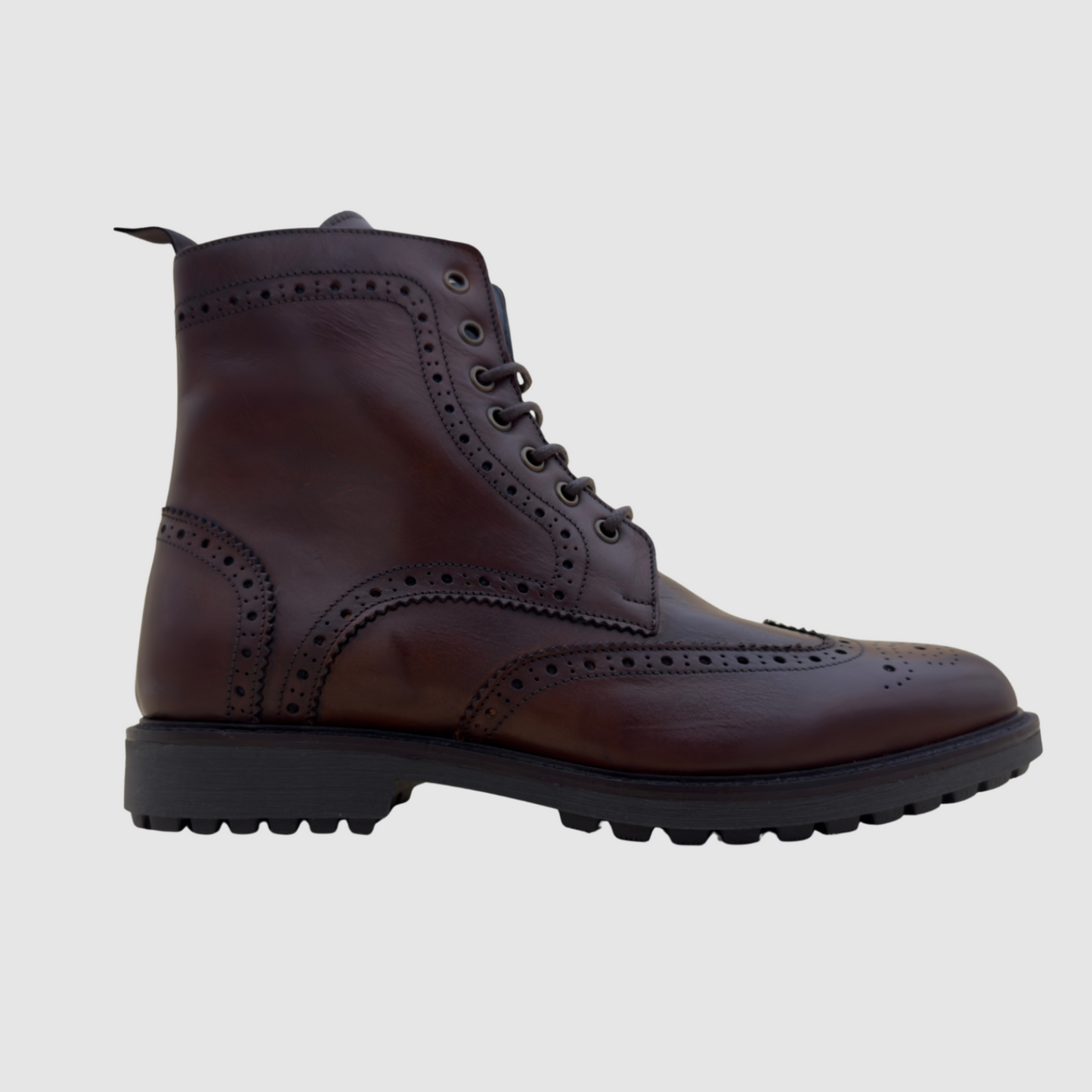 Bottines homme cuir marron brogue profil semelle épaisse