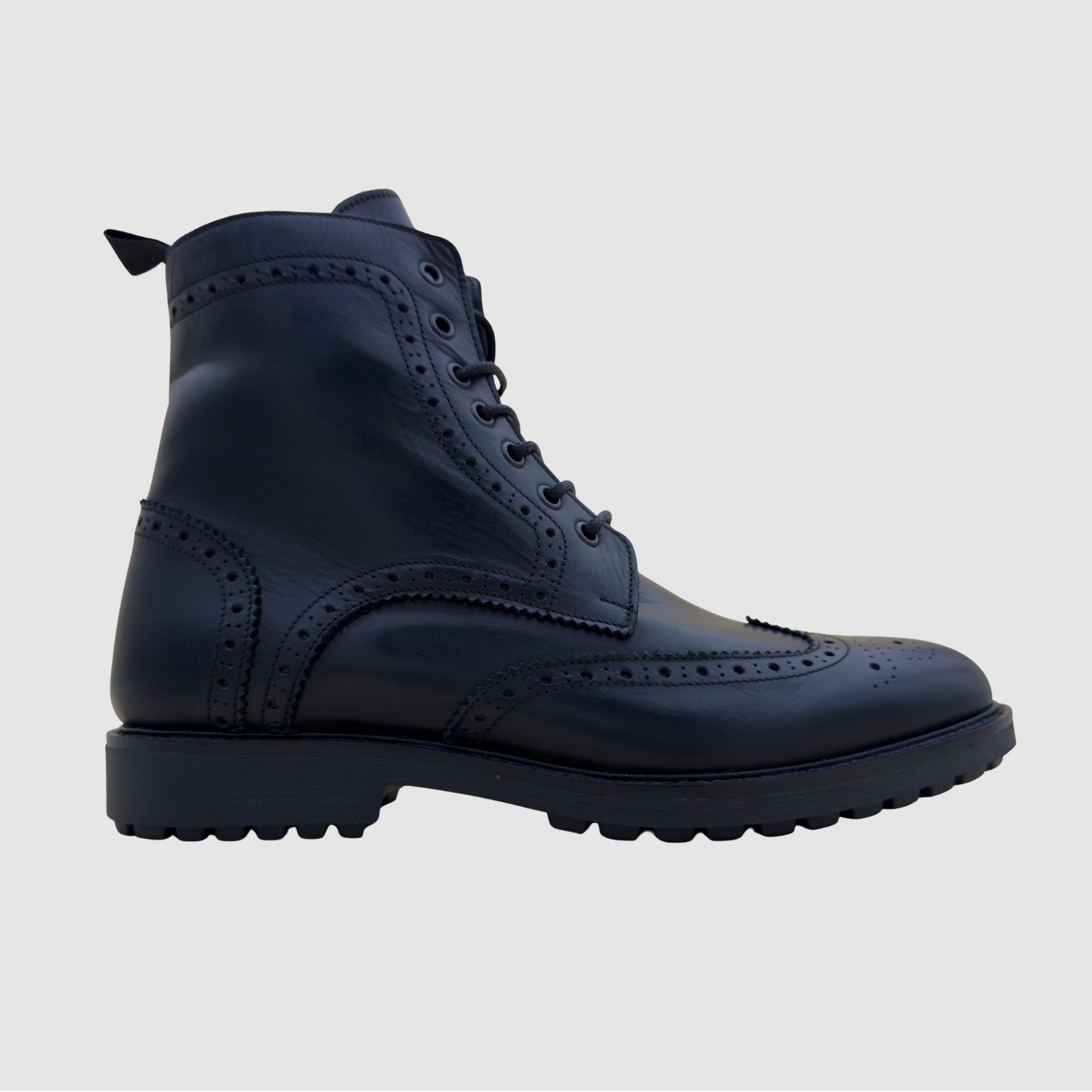 Bottines homme cuir noir brogue profil avec semelle robuste