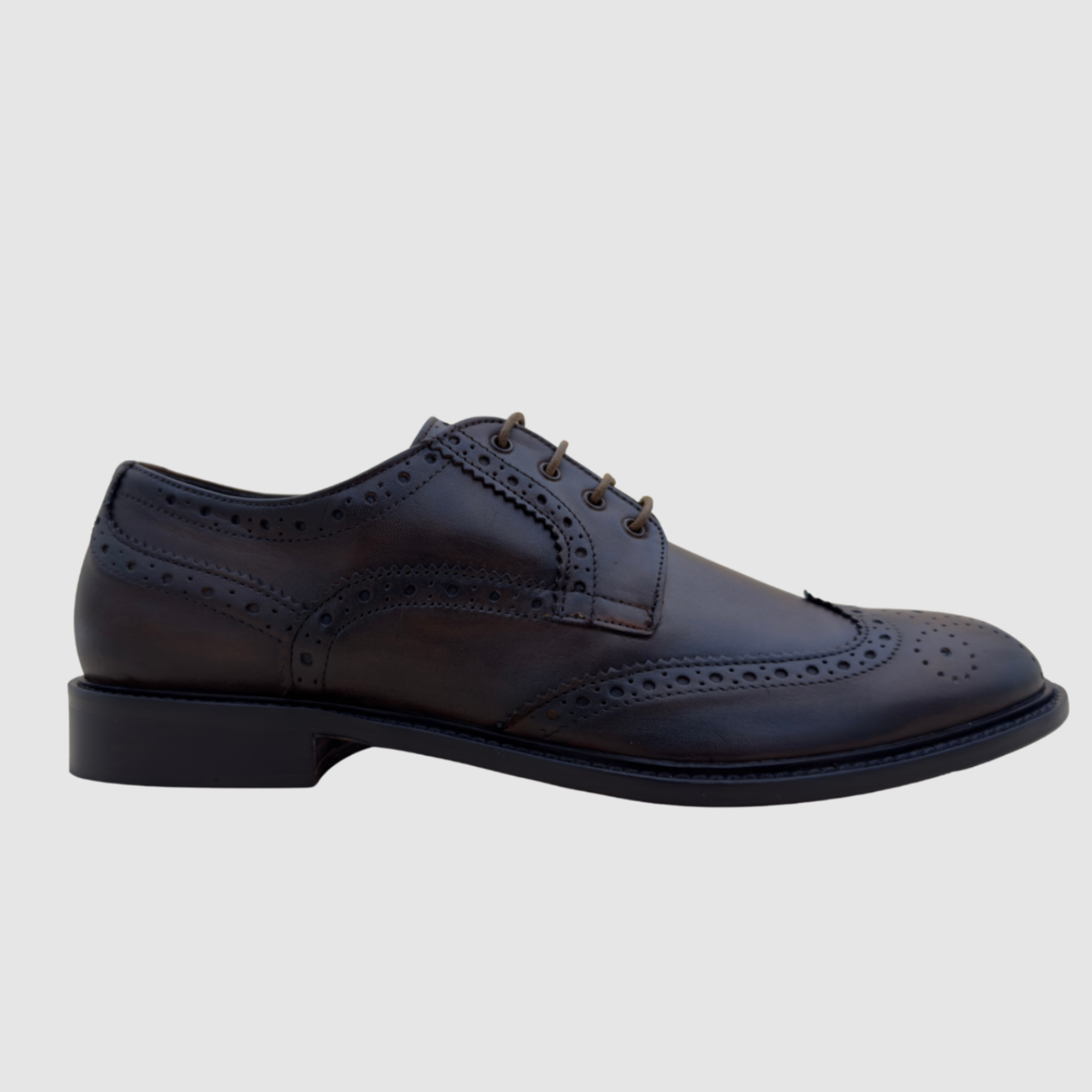 Derby brogue homme cuir marron profil latéral silhouette élégante