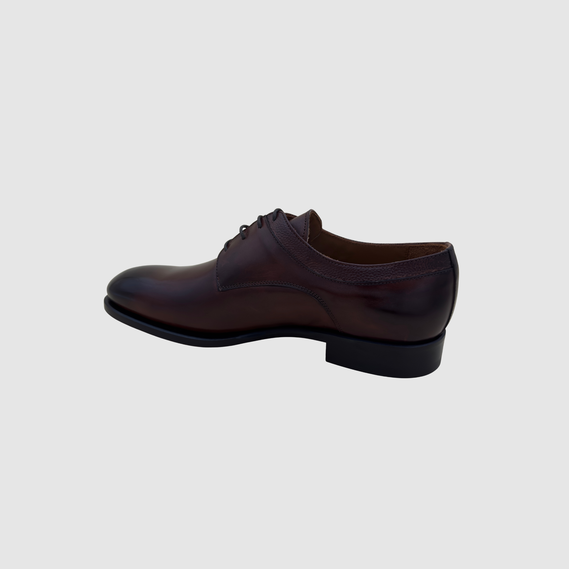 Chaussure derby homme cuir patiné bordeaux profil latéral finition artisanale