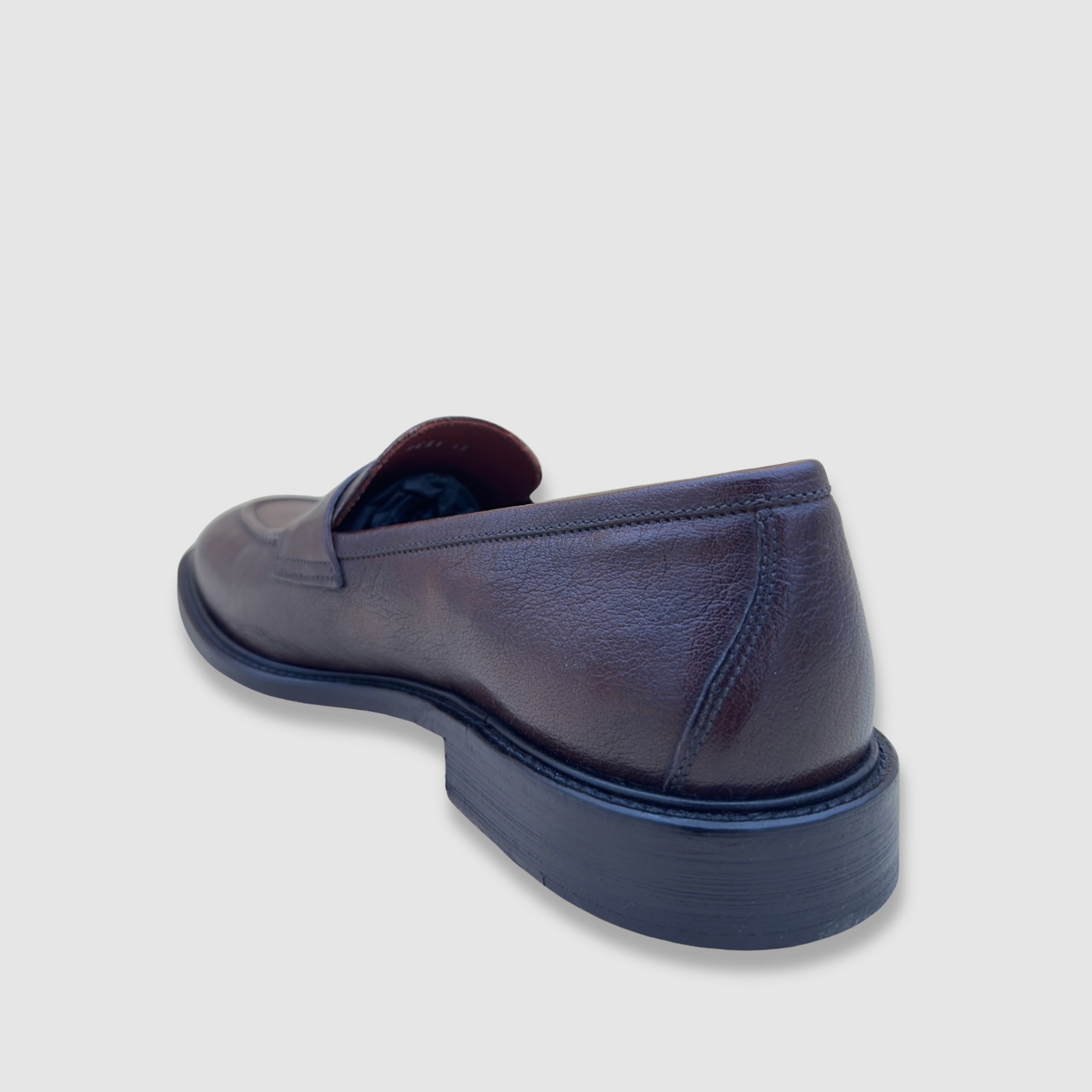 Vue arrière mocassin homme cuir acajou talon 2,5 cm finition haut de gamme